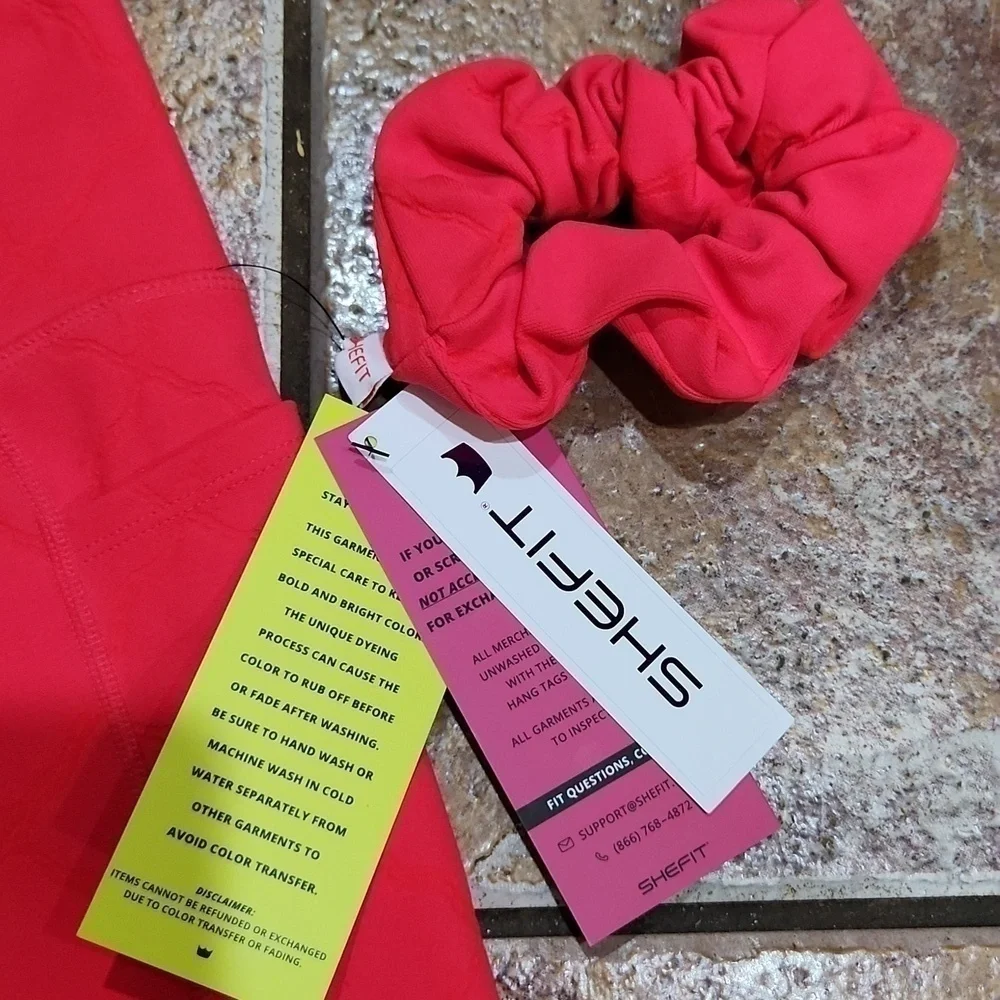 Shefit pocket leggings size medium bright fun fitness with scrunchis and laundry